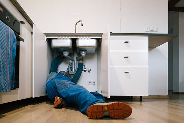 Professional Emergency Plumber technician working in North Lake, WI